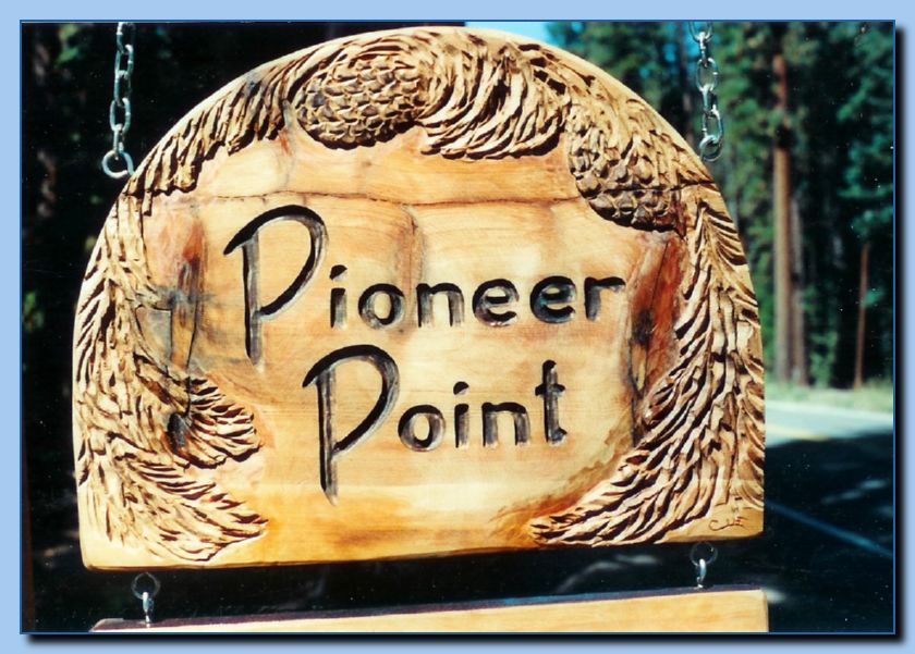 2-20 sign pine cones and boughs-archive
